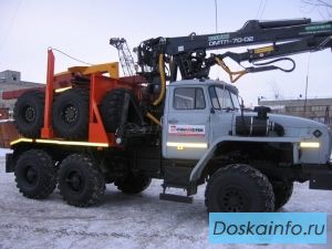 Лесовозный тягач Урал 2013 г.в. с манипулятором  Омтл-70,02  с прицепом роспуском