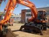 Аренда полноповоротного колесного          экскаватора