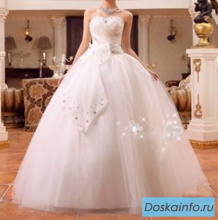Изысканное свадебное платье с бантом