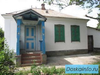 Земельный участок и добротный дом в ст. Петропавловской